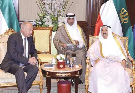 A handout photo provided by the Kuwaiti news agency Kuna yesterday shows the Emir of Kuwait, Sheikh Sabah al-Ahmad al-Sabah, meeting with Arab League chief Ahmed Abul Gheit (left) at the Bayan palace in Kuwait City.