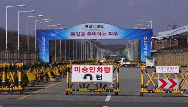 A barricade is set on the road leading to the truce village of Panmunjom at a South Korean military checkpoint in the border city of Paju near the Demilitarized Zone (DMZ)