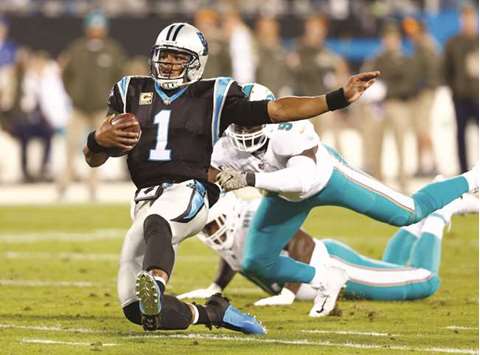 Carolina Panthers quarterback Cam Newton (1) slides for a first down in the first quarter against the Miami Dolphins at Bank of America Stadium. Picture: Jeremy Brevard-USA TODAY Sports