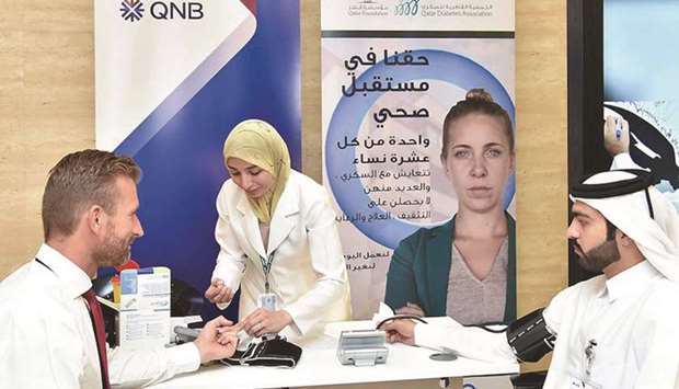 QNB staff members being examined during the campaign.