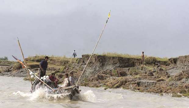 This file photo shows fishermen working near a newly-formed land at Boyer Char in Bangladeshu2019s Noakhali district.