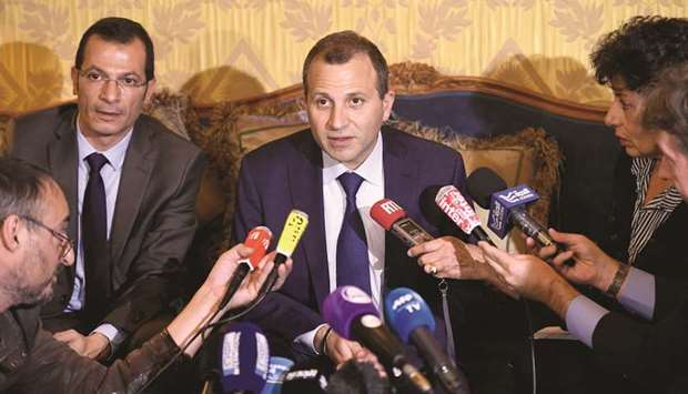 Lebanese Foreign Minister Gebran Bassil (centre) delivers a press conference at the Embassy of Lebanon in Paris yesterday.