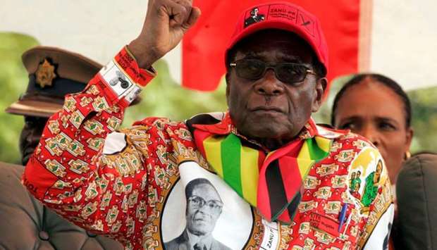 Robert Mugabe gestures at an election rally in the small town of Shamva northeast of the capital Harare, May 29, 2008