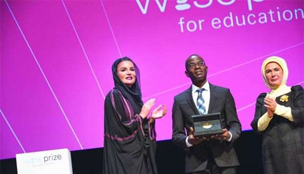 HH Sheikha Moza bint Nasser and Emine Erdogan, the First Lady of Turkey, applaud after the former presented the WISE Prize For Education 2017 to Patrick Awuah, founder and president of Ashesi University College, Ghana, on Wednesday. PICTURE: AR Al-Baker/HHOPL