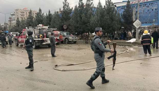 Afghan secuirty forces are seen at the site of an explosion in Kabul
