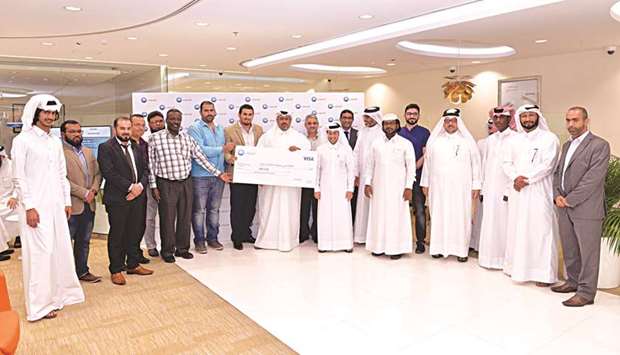 u2018Win Every Day with QIB Visa Cardu2019 campaign winners.