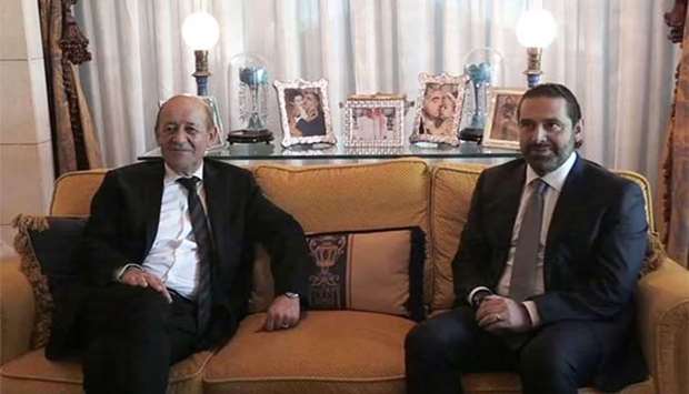 French Foreign Minister Jean-Yves Le Drian (left) meets with Saad Hariri in the Saudi capital Riyadh on Thursday.