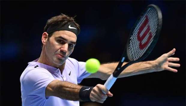 Roger Federer returns to Marin Cilic at the O2 Arena in London on Thursday.