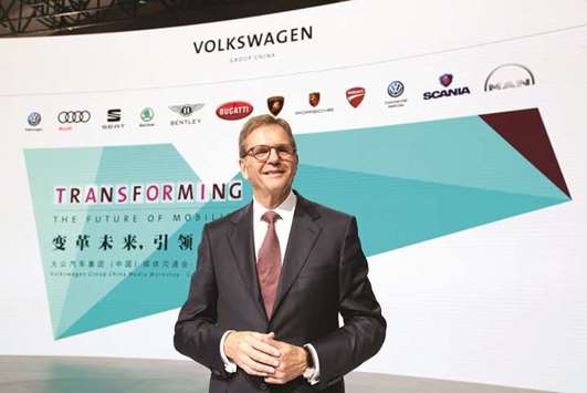 Jochem Heizmann, president and CEO of Volkswagen China, poses during an interview in Guangzhou. u201cChina is leading the way to the final breakthrough in the adoption of e-mobility and Volkswagen Group China is determined to be at the forefront,u201d said Heizmann.