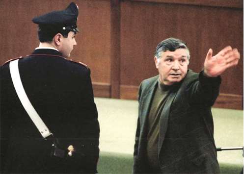 This picture taken on March 8, 1993 shows mafia boss Riina during his trial at the high-security prison Ucciardone in Palermo.