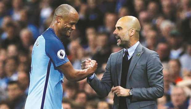 File picture of Vincent Kompany with Pep Guardiola.