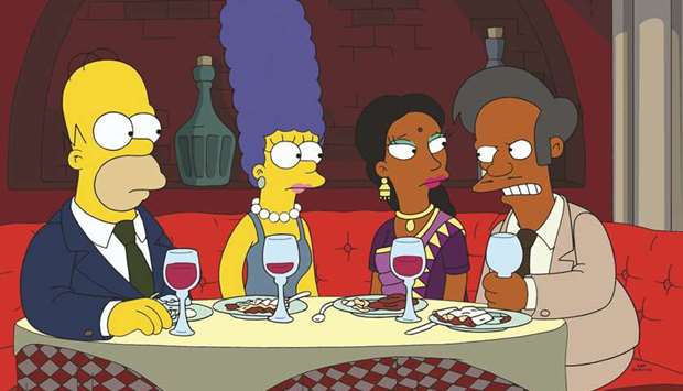Apu, right, with his wife Manjula, and Homer and Marge Simpson in the episode Much Apu About Something.