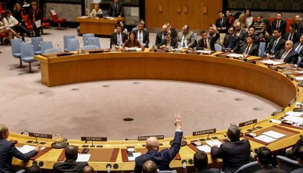 Russian Ambassador to the United Nations Vasily Nebenzya votes against a bid to renew an international inquiry into chemical weapons attacks in Syria, during a meeting of the UN Security Council at the United Nations headquarters in New York, US, November 17, 2017. Reuters