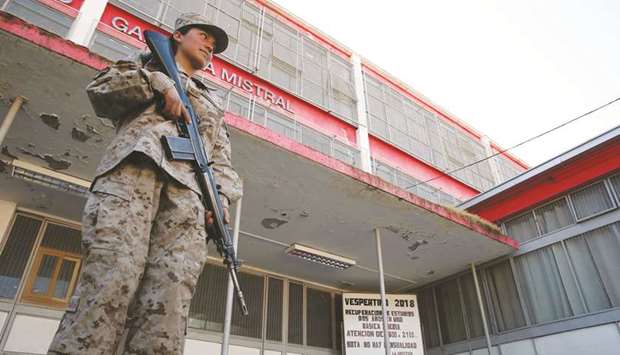 A Chilean soldier at a polling station in Santiago.