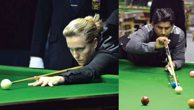 Belgiumu2019s Wendy Jans (left) and Pakistanu2019s Asjad Iqbal (right) in action on day one of the IBSF World Snooker Championship at Al Arabi Sports Club yesterday. (IBSF)