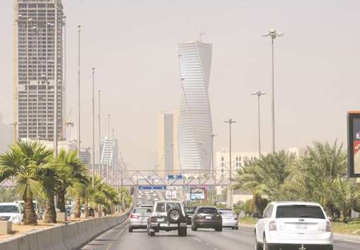Saudi commuters drive down a main street in the capital Riyadh. Saudi Arabiau2019s market regulator has frozen the trading accounts of people detained or investigated, people familiar with the matter have said.