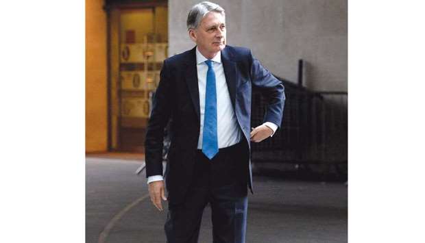 Chancellor of the Exchequer Philip Hammond arrives at BBC Broadcasting House to attend a recording of The Andrew Marr Show in London yesterday.