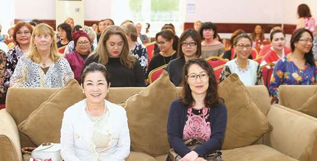 ENGROSSED: Chief guest Haruhi Otsuka, left (seated), with other guests at the event.