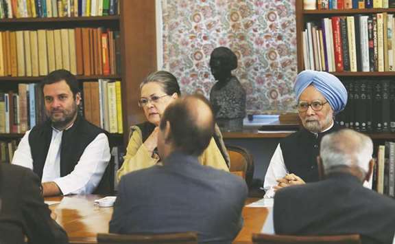 Congress Party president Sonia Gandhi, vice-president Rahul Gandhi and former prime minister Manmohan Singh look on during the Congress Working Committee (CWC) meeting at the party headquarters in New Delhi yesterday.