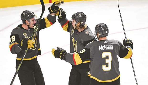 Vegas Golden Knights centre William Karlsson (centre) celebrates with right wing Reilly Smith (right) and defenseman Brayden McNabb after scoring a goal against the Los Angeles Kings at T-Mobile Arena. PICTURE: USA TODAY Sports