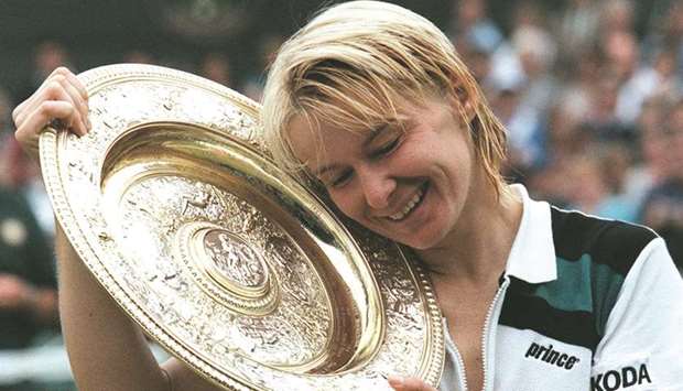 Jana Novotna after winning the 1998 womenu2019s singles at Wimbledon. (AFP)