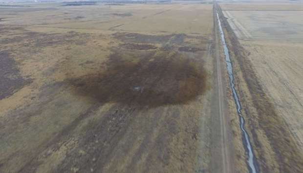 The darkened ground of an oil spill which shut down the Keystone pipeline in an agricultural area near Amherst, South Dakota.
