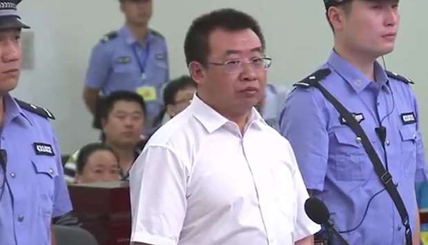 Chinese rights lawyer Jiang Tianyong (C) appearing in court in Changsha in China's central Hunan province. File picture: August 22, 2017