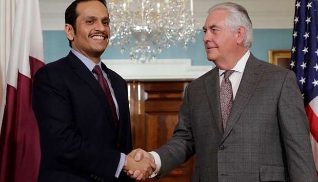 Qataru2019s Deputy Prime Minister and Foreign Minister HE Sheikh Mohamed bin Abdulrahman al-Thani shakes hands with US Secretary of State Rex Tillerson before their meeting at the State Department in Washington yesterday.