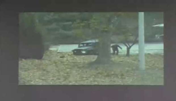 A CCTV footage shows a North Korean soldier running from a vehicle during a United Nations Command (UNC) briefing on the investigation results of the soldier?s defection, at the South Korean defence ministry in Seoul in this still image taken from a Reuters TV video, November 22, 2017