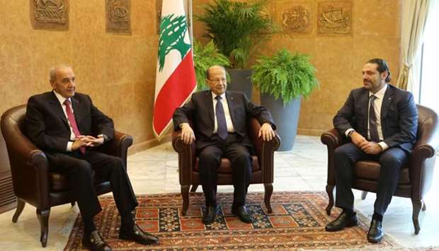 Lebanese President Michel Aoun meets with Saad al-Hariri, who announced his resignation as Lebanon's prime minister from Saudi Arabia and Lebanese Parliament Speaker Nabih Berri at the presidential palace in Baabda, Lebanon.