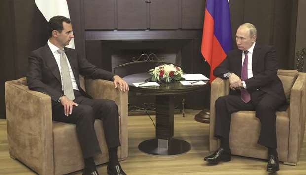 Russian President Vladimir Putin meets with Syrian President Bashar al-Assad in the Black Sea resort of Sochi.