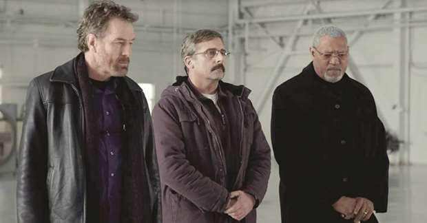 CAREFULLY RECONCILING: Bryan Cranston as Sal Nealon, left; Steve Carell as Larry Doc Shepherd, centre; and Laurence Fishburne as Richard Mueller in a scene from the film.
