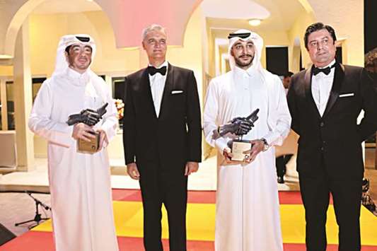 Al-Kaabi and Sheikh Faleh, along with Escobar and Vicente after receiving the award.