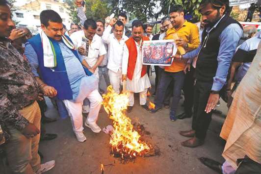Demonstrators burn an effigy depicting film director Sanjay Leela Bhansali during a protest, organised by members of Bharat Kshatriya Samaj, against the release of Padmavati, in Kolkata yesterday.
