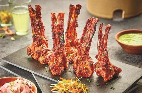 TASTE TO RECKON WITH: Lamb chops are dipped in marinated spices for sometime before they are cooked on medium grill heat. Photo by the author