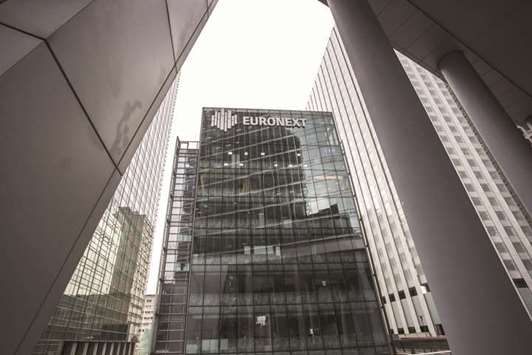 The Euronext logo is seen on the exterior of the Paris Stock Exchange. The CAC 40 gained 0.5% at 5,379.54 points yesterday.