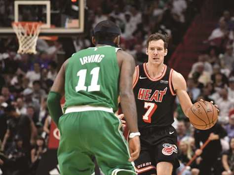 Miami Heat guard Goran Dragic dribbles the ball against Boston Celtics guard Kyrie Irving during the first half of their NBA game at the American Airlines Arena. PICTURE: USA TODAY Sports