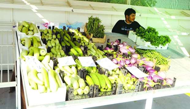 A stall with local vegetables at one of the yards.