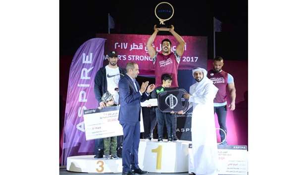 Abdulaziz al-Kuwari was named this yearu2019s strongest Qatari at the u2018Qataru2019s Strongest Manu2019 (QSM) 2017 competition, organised for the fifth year by Aspire Zone Foundation (AZF) at Aspire Park. Meanwhile, QSM 2014 winner Talal al-Kuwari finished second, followed by Hadi Ali al-Marri in third place, AZF said in a press statement. PICTURES: Shaji Kayamkulam Page 28