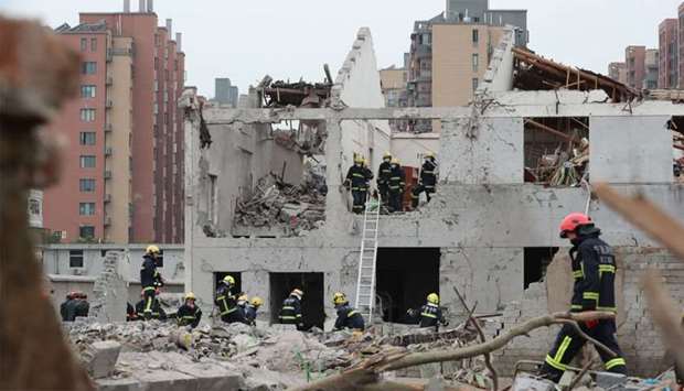 Rescue workers are seen at the site of an explosion in Ningbo, China's eastern Zhejiang province