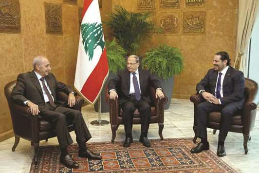 Lebanese President Michel Aoun meets with Prime Minister Saad al-Hariri, and Lebanese Parliament Speaker Nabih Berri at the presidential palace in Baabda,yesterday.
