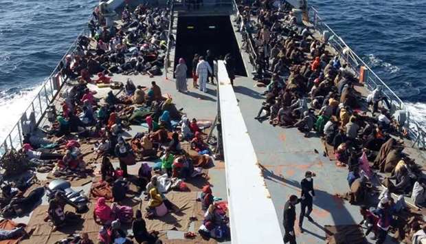 Migrants after they were rescued