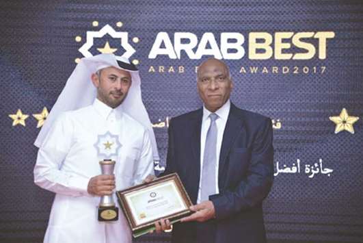 Mohamed Khalifa al-Suwaidi, AZFu2019s CEO, receiving the award on behalf of his organisation.