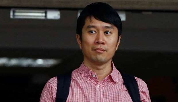 Civil rights activist Jolovan Wham leaves the State Court after a hearing in Singapore