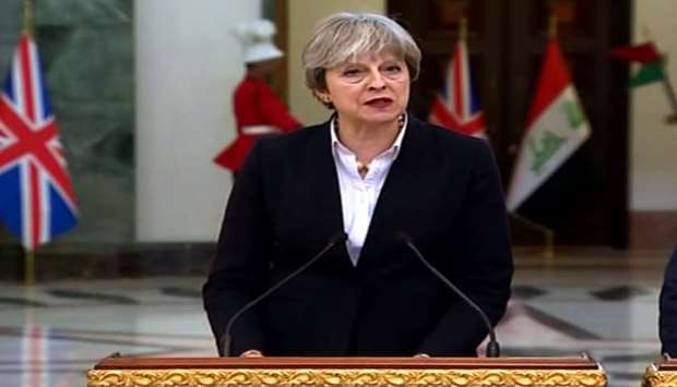 British Prime Minister Theresa May holding a press conference in Baghdad - An image grab obtained from a handout video released by the Iraqi Prime Minister's office.