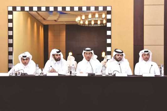 Al Khaliji chairman and managing director Sheikh Hamad bin Faisal bin Thani al-Thani and other directors at the banku2019s deferred ordinary and extraordinary general assembly meetings at the Marriot Marquis yesterday.