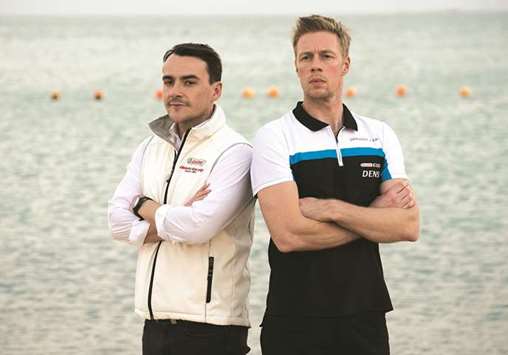 Title contenders Norbert Michelisz (left) of Honda and Thed Bjork of Volvo strike a pose at the St Regis Doha yesterday.