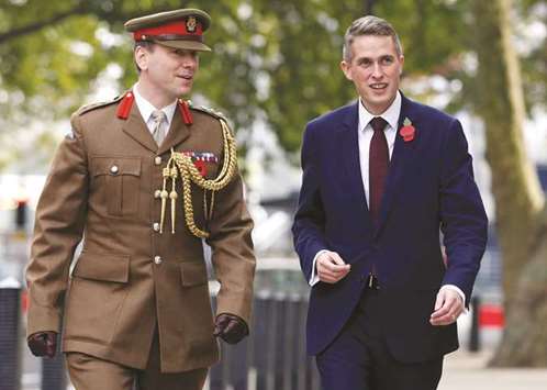 New Defence Secretary, Gavin Williamson, arrives at the ministry of defence, in London yesterday.