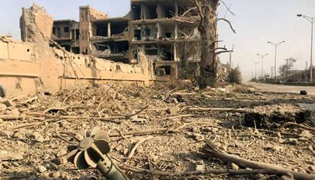 The damage in the eastern Syrian city of Deir Ezzor is seen during a military operation by government forces against Islamic State group on Saturday.