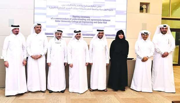 QU and Qatar Rail officials at the signing ceremony.